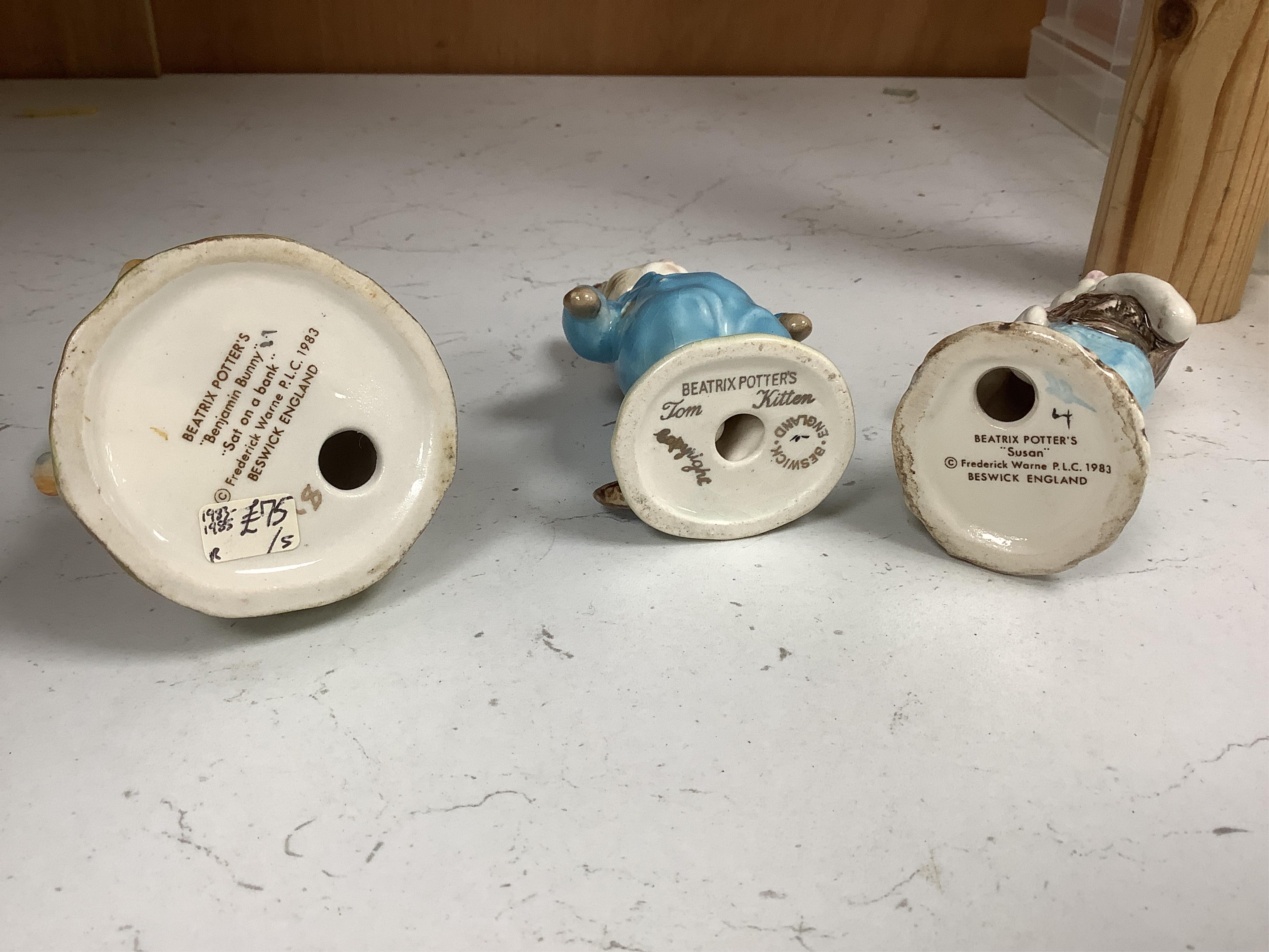 Nine Beswick Beatrix Potter figures, some stamped F. Warne & Co , largest 17cm high